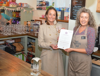 Presentation of Queens Award to the shop
